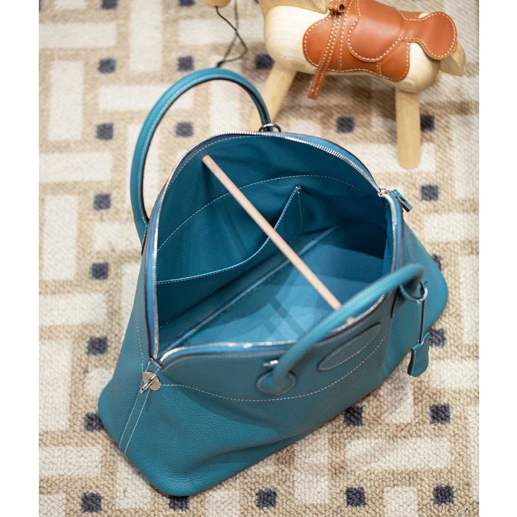 Sac à main coquille en cuir Togo.